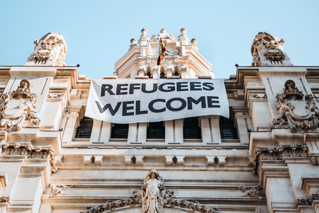 Banner saying "Refugees Welcome"